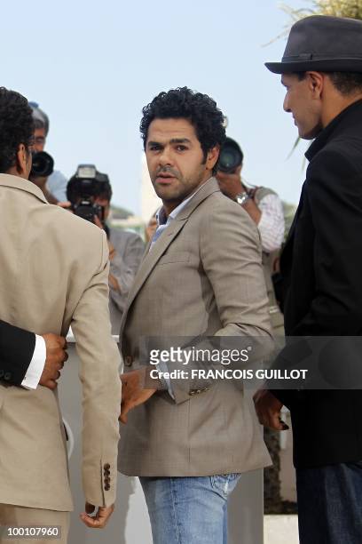 French actor Jamel Debbouze poses during the photocall of "Hors La Loi" presented in competition at the 63rd Cannes Film Festival on May 21, 2010 in...