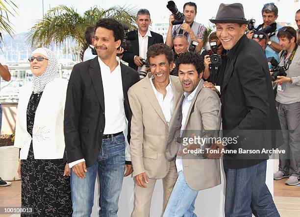 Chafia Boudraa, Sami Bouajila, Director Rachid Bouchareb, Jamel Debbouze and Roschdy Zem attend the 'Outside the Law' Photo Call held at the Palais...