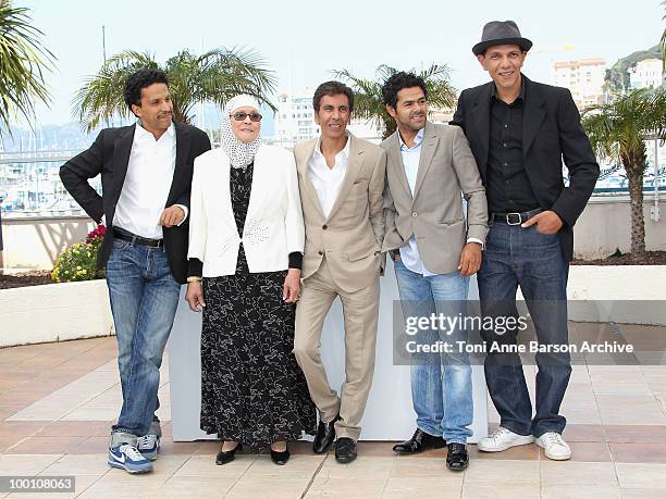 Sami Bouajila, Chafia Boudraa, Director Rachid Bouchareb, Jamel Debbouze and Roschdy Zem attend the 'Outside the Law' Photo Call held at the Palais...