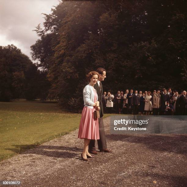 King Baudouin of Belgium with his fiance Fabiola de Mora y Aragon in the grounds of Ciergnon Castle, Belgium, 1960.