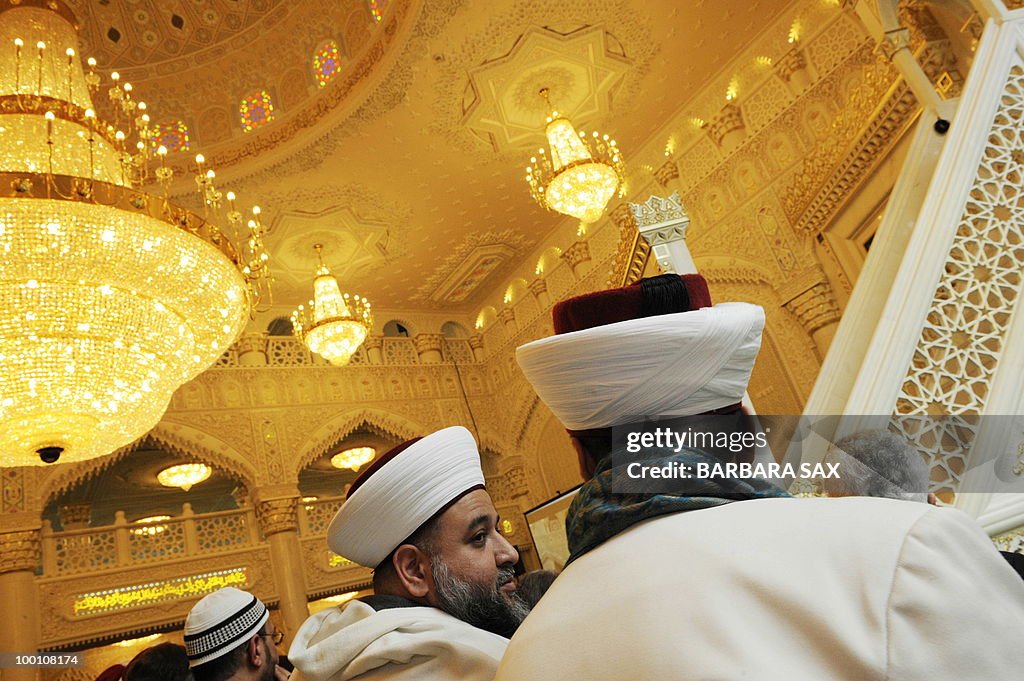 Imams attend a service to inaugurate the