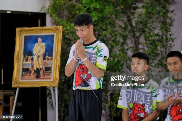 Soccer coach, Ekkapol Chantawong , and twelve boys from the "Wild Boars" soccer team arrive for a press conference for the first time since they were...