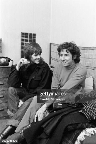 Jane Fonda pictured with her boyfriend Tom Hayden at a friends house in Camden Town. Mr Hayden has trouble with the immigration authorities at London...