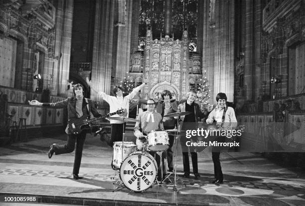 The Bee Gees perform at Liverpool Anglican Cathedral. The Bee Gees are brothers Maurice, Barry and Robin Gibb, Colin Peterson and Vince Malouney. The...