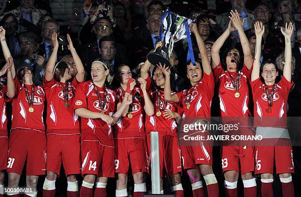 Turbine Potsdam's football players celebrate after wining their UEFA women's Final Champions League football match against Olympique Lyonnais at...