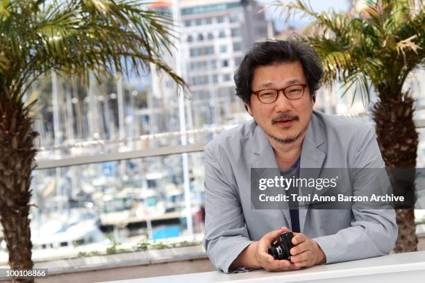 Director Sangsoo Hong attends the 'Ha Ha Ha' Photocall held at the Palais des Festivals during the 63rd Annual International Cannes Film Festival on...