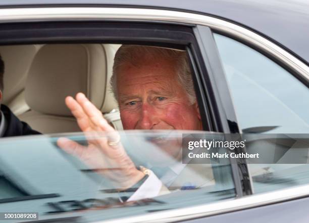 Prince Charles, Prince of Wales visits Honiton, and attends the town's 'Gate-to-Plate' food market, meeting residents and local producers on July 18,...