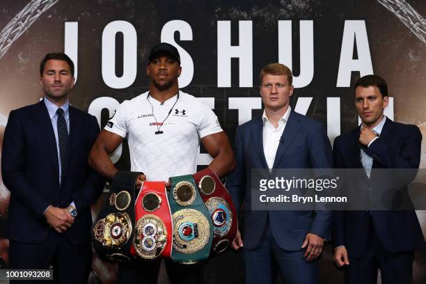Promoter Eddie Hearn, Anthony Joshua and Alexander Povetkin attend a press conference at Wembley Stadium on July 18, 2018 in London, England.