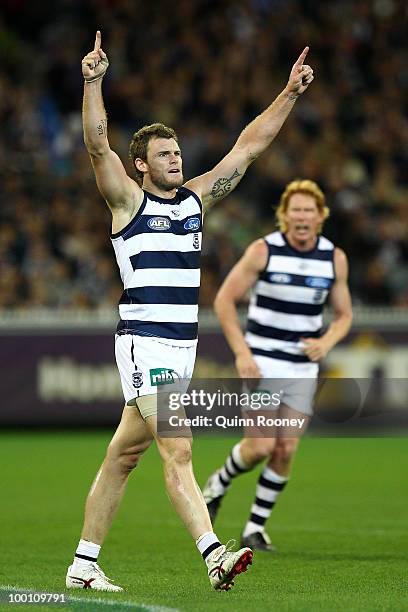 Cameron Mooney of the Cats celebrates kicking a goal during the round nine AFL match between the Collingwood Magpies and the Geelong Cats at...