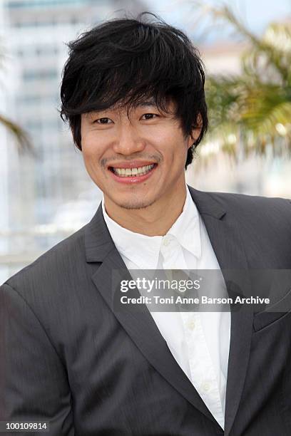 Joonsang Yu attends the 'Ha Ha Ha' Photocall held at the Palais des Festivals during the 63rd Annual International Cannes Film Festival on May 21,...