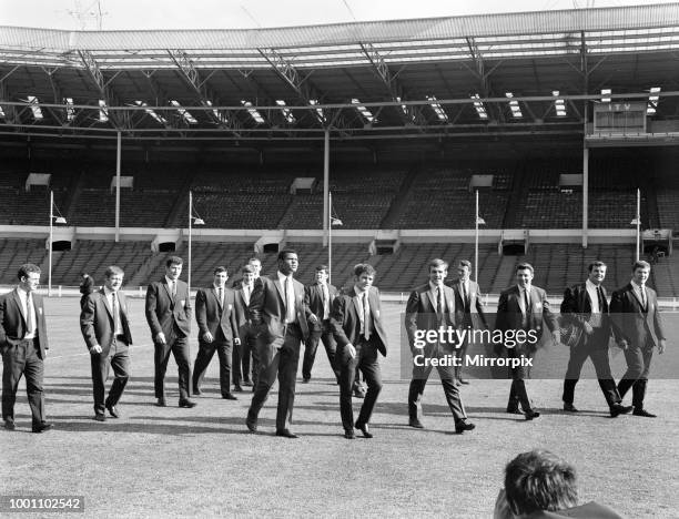 Salford Red Devils rugby league team members inspect the pitch at Wembley Stadium ahead of their Challenge Cup Final match against Castleford....