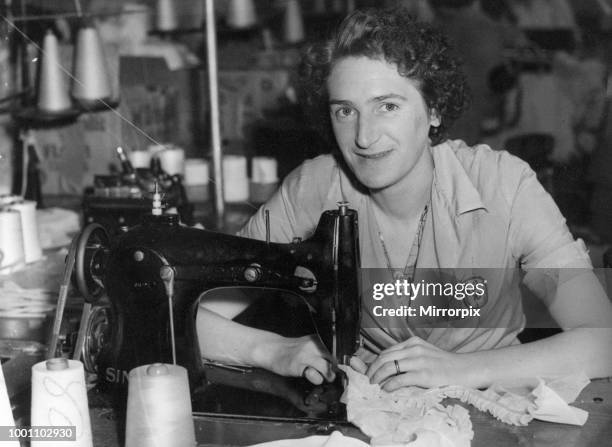 Mrs Boyl Stevens, sewing machine operator at Kayser Bondor, Pentrebach & Dowlais, Merthyr Tydfil, Wales, Tuesday 17th June 1958. Kayser Bondor at...