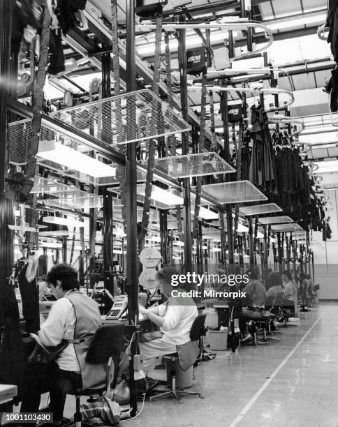 General view showing workers at the Laura Ashley textiles factory in Carno, Powys, Wales. April 1992.