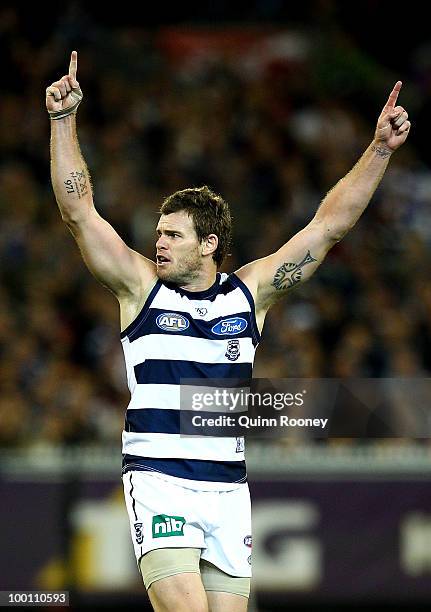 Cameron Mooney of the Cats celebrates kicking a goal during the round nine AFL match between the Collingwood Magpies and the Geelong Cats at...