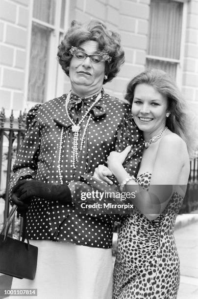 Barry Humphries, as Dame Edna Everage, pictured with his wife Diane Millstead, 17th June 1979.