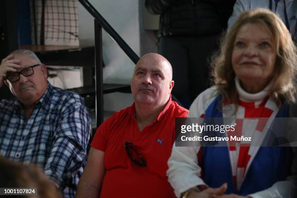 Croatian supporters look on during the FIFA World Cup Russia final against France at Dobar Tek Bar on July 15, 2018 in Buenos Aires, Argentina.