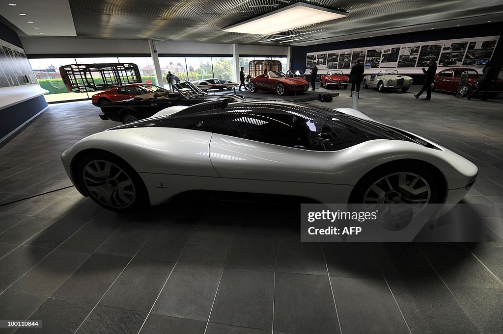 Cars are displayed in the Pininfarina Mu