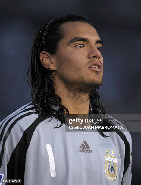 Argentina's goalkeeper Sergio Romero sings the national anthem before the start of the FIFA World Cup South Africa-2010 qualifier football match...