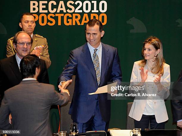 Prince Felipe of Spain and Princess Letizia of Spain deliver Caja Madrid Post Grade Grants at the Reina Sofia museum on May 21, 2010 in Madrid, Spain.