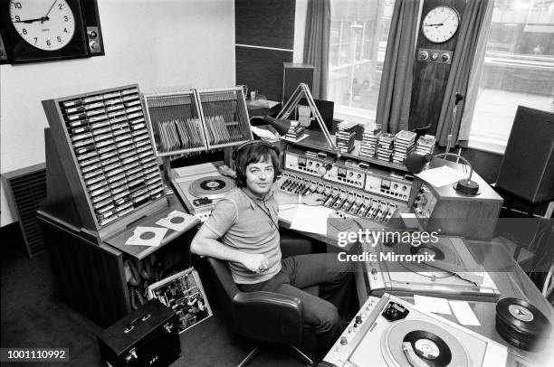 Radio Disc Jockey Tony Blackburn pictured in the studio, 21st June 1973.