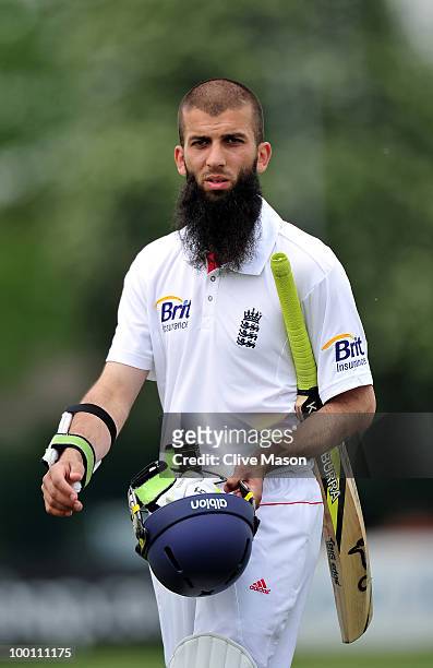 Moeen Ali of England Lions walks off having hit the winning runs during day three of the match between England Lions and Bangladesh at The County...
