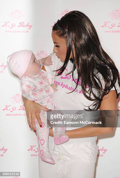 Katie Price attends photocall to launch her new range of Baby Clothes - KP BABY on May 20, 2010 in London, England.