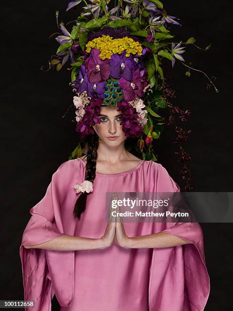 Model poses for the studio photo session at the 9th Annual "Tulips & Pansies: A Headdress Affair" at Gotham Hall on May 20, 2010 in New York City.