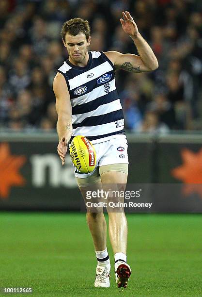 Cameron Mooney of the Cats kicks during the round nine AFL match between the Collingwood Magpies and the Geelong Cats at Melbourne Cricket Ground on...