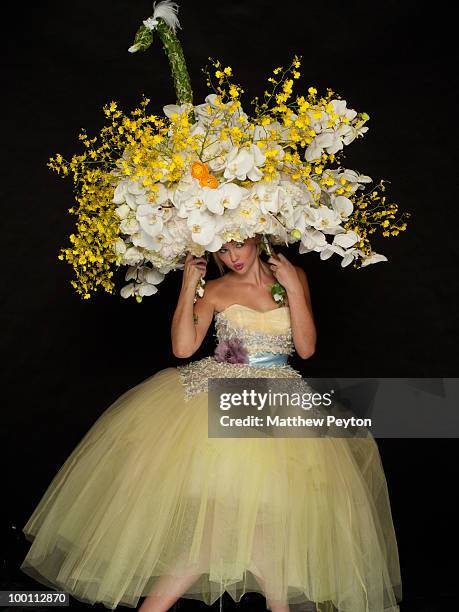 Model poses for the studio photo session at the 9th Annual "Tulips & Pansies: A Headdress Affair" at Gotham Hall on May 20, 2010 in New York City.