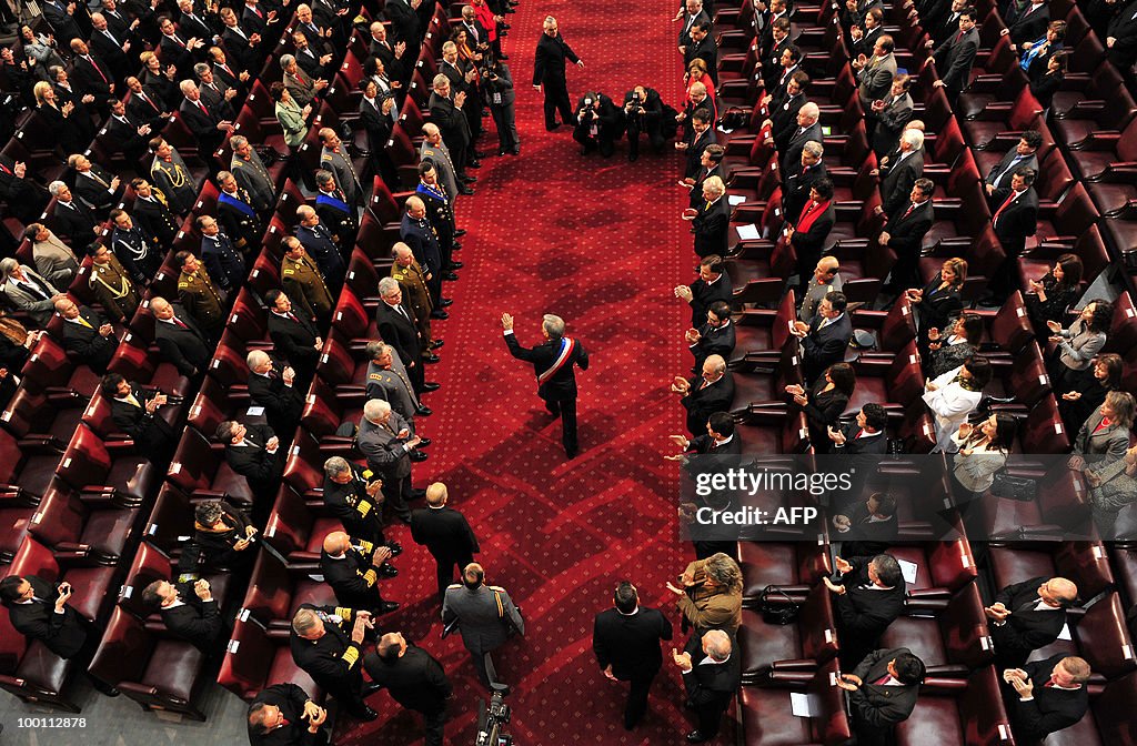 Chilean President Sebastian Pinera waves