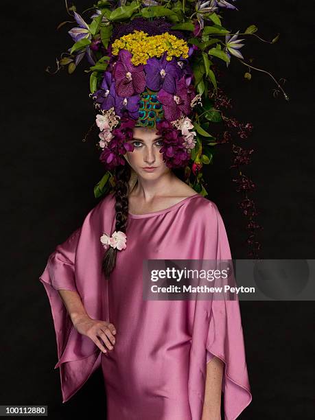 Model poses for the studio photo session at the 9th Annual "Tulips & Pansies: A Headdress Affair" at Gotham Hall on May 20, 2010 in New York City.