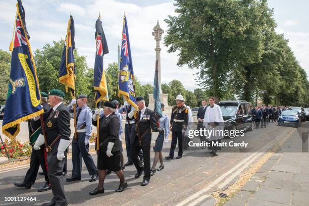 The coffin of World War 2 veteran Patrick Churchill is carried from St Mary The Virgin Church, to the War Memorial on Church Green in Witney on July...