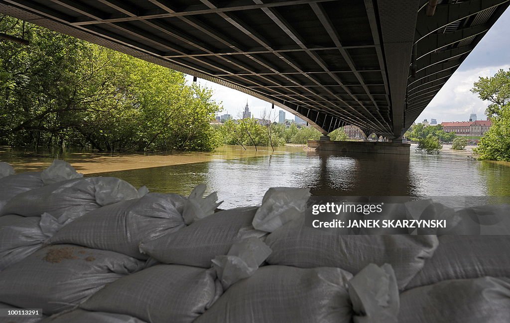 Sand badgs under a bridge protect the ro