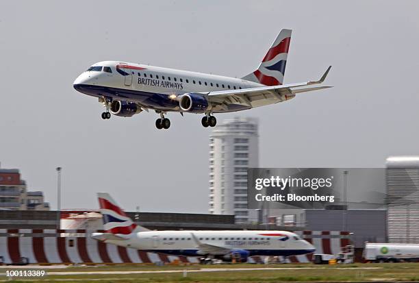 British Airways airplane comes into land at City Airport in London, U.K., on Friday, May 21, 2010. British Airways Plc said it will break even this...