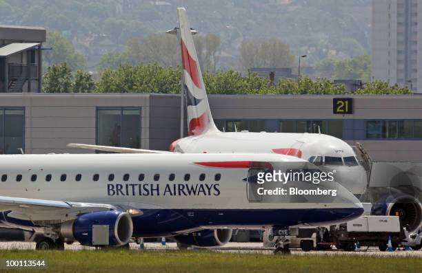 British Airways airplane taxis towards the runway at City Airport in London, U.K., on Friday, May 21, 2010. British Airways Plc said it will break...