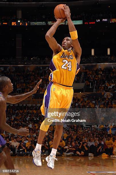 Kobe Bryant of the Los Angeles Lakers shoots against Jason Richardson of the Phoenix Suns in Game One of the Western Conference Finals during the...