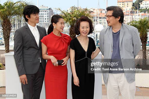 Joonsang Yu, Jiwon Ye, Yuh-Jung Youn and Director Sangsoo Hong attends the 'Ha Ha Ha' Photocall held at the Palais des Festivals during the 63rd...