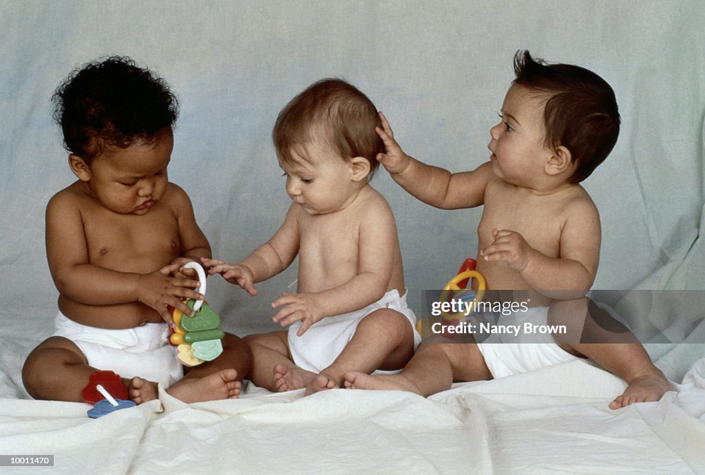 MULTI-ETHNIC BABIES INTERACTING