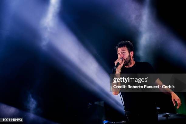 Tom Meighan and his group Kasabian performs on stage on July 15, 2018 in Naples, Italy.