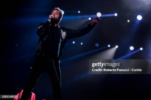 Tom Meighan and his group Kasabian performs on stage on July 15, 2018 in Naples, Italy.