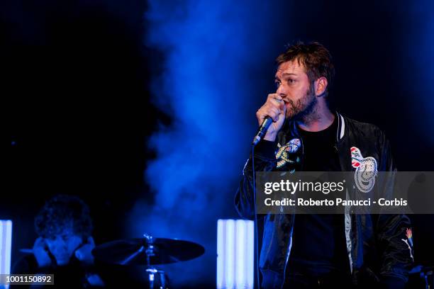 Tom Meighan and his group Kasabian performs on stage on July 15, 2018 in Naples, Italy.