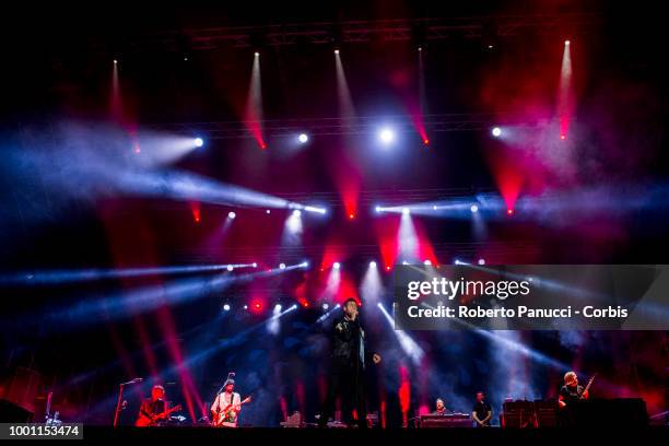 Tom Meighan and his group Kasabian performs on stage on July 15, 2018 in Naples, Italy.