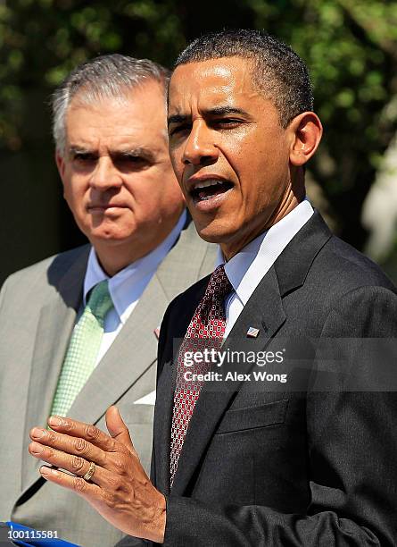 President Barack Obama speaks at the Rose Garden of the White House as Transportation Secretary Ray LaHood listens May 21, 2010 in Washington, DC....