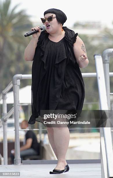 Singer Beth Ditto is seen singing on the beach during the 63rd Cannes Film Festival on May 21, 2010 in Cannes, France.