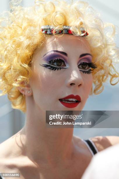 Kelsey Wiens performs at the top of The Empire State Building on May 21, 2010 in New York City.