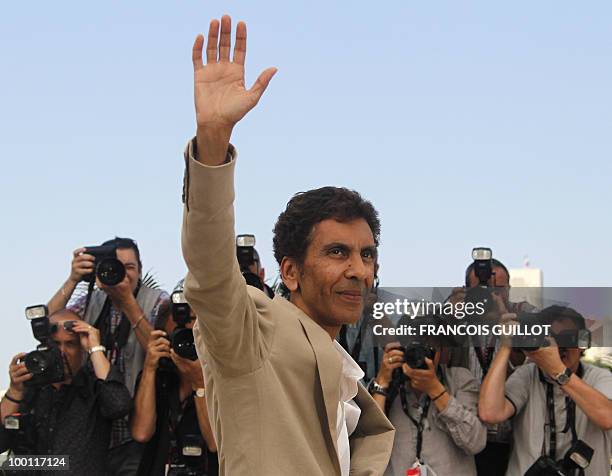 French director Rachid Bouchareb poses during the photocall of "Hors La Loi" presented in competition at the 63rd Cannes Film Festival on May 21,...