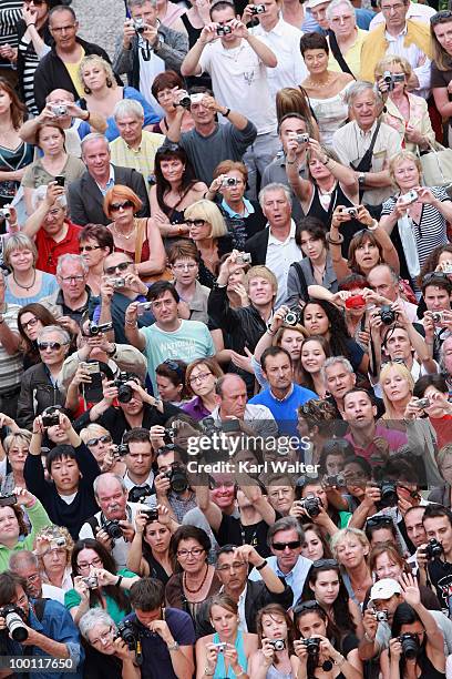 Crowds attend the 'Outside Of The Law' Premiere at the Palais des Festivals during the 63rd Annual Cannes Film Festival on May 21, 2010 in Cannes,...