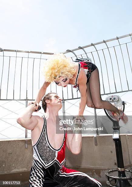 Kelsey Wiens and Preston Jamieson perform at the top of The Empire State Building on May 21, 2010 in New York City.