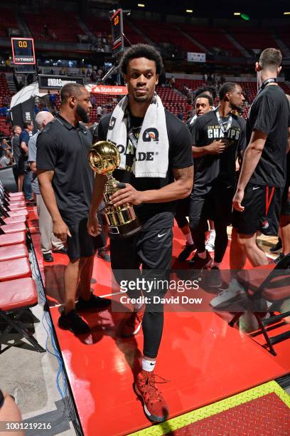McDaniels of the Portland Trail Blazers walks off the court with the Summer League MVP Trophy after winning the 2018 Las Vegas Summer League against...