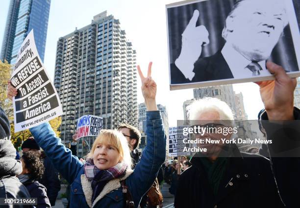 Musician and activist Graham Nash of Crosby, Stills & Nash and girlfriend Amy Grantham join march - Thousands of protestors gather and march from...